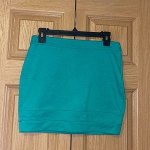 Green fitted mini skirt (brand unknown)